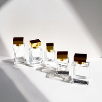 Vente en gros de flacons vaporisateurs transparents noirs et blancs de 50 ml et 100 ml, flacons de parfum avec bouchon à vis, boîte rigide d'emballage