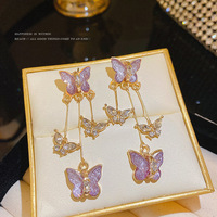 Boucles d'oreilles longues papillon en cristal violet esthétique pour femmes
