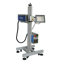 Ligne de production de bouteilles en plastique PET machine d'impression laser date logo code qr RF 40W co2 prix de la machine de marquage laser volant