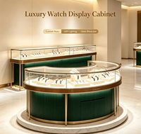 Comptoir d'exposition de montres de luxe sur mesure, vitrine de bijouterie, présentoir de magasin de montres avec cadre métallique vert foncé et éclairage LED