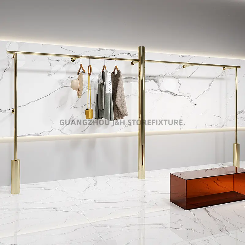 Modische wandige Kleider ständer für Boutique Gold Kleiderbügel Luxus Kleidung Display Schuhe Shop Interior Design