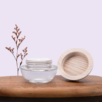 50g Color claro Claro Vidrio transparente Frasco cosmético Ceniza Tapa de madera Tapa de plástico Capacidad para el embalaje del cuidado de la piel