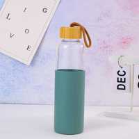 Bouteilles d'eau en verre borosilicate de haute qualité avec manchon en silicone, sans BPA, réutilisables, transparentes, avec couvercle en bambou anti-fuite
