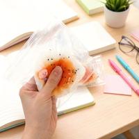 Jouet sensoriel anti-stress en forme de boule de riz triangulaire réaliste en TPR, doux et mignon, conçu pour enfants et adultes