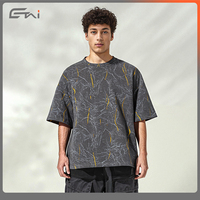 Tshirt dua warna mewah Streetwear Laser grafis cetakan kotak sesuai pesanan Batik T Shirt dengan pola pencahayaan Devore Burn-out kerajinan