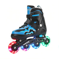 Patins à roulettes Tuoli bleu-noir pour enfants, à une rangée, roulements ABEC-7, roues entièrement lumineuses en tissu PU, réglables, pour garçons débutants