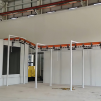 Ligne de peinture en poudre semi-automatique avec cabine et four de cuisson sur rail suspendu pour la finition des surfaces de panneaux métalliques