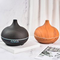 Le plus récent diffuseur d'arôme électrique de 500ml avec humidificateur d'air d'huile essentielle en bois télécommandé de 7 couleurs LED