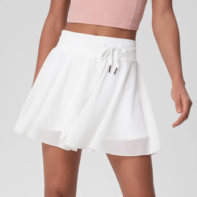 Jupes de tennis pour femmes avec poches Shorts jupes de golf athlétiques jupes pour femmes jupes d'entraînement de course à taille haute