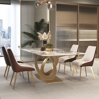 Table à manger moderne en pierre frittée postmoderne de luxe en acier inoxydable grand petit appartement villa modèle chambre salon en métal