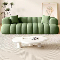Canapé d'angle style crème inspiré de la texture des nuages noirs Marshmallow pour petit appartement, hôtel, villa, avec revêtement en tissu