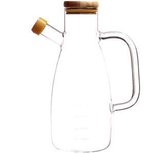 Dispensador de aceite de oliva higiénico de vidrio de boro con mango y cubierta de bambú - Product Image 1