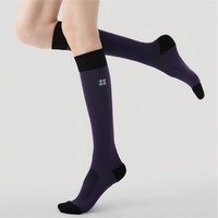 Chaussettes de course à compression pour femmes avec logo personnalisé, chaussettes de saut à la corde, chaussettes de basketball doublées en tissu éponge, chaussettes de soutien musculaire, chaussettes de sport pour les mollets
