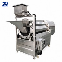 Machine à assaisonnement pour frites et chips de pommes de terre, avec pulvérisation liquide, pour le mélange et le revêtement des frites et chips de pommes de terre aux saveurs épicées