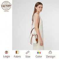 Grand sac seau imperméable à glands en PU style vintage avec fermeture à glissière doublure en polyester sacs à main pour femmes à la mode
