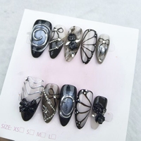 Uñas artificiales en forma de almendra; Diseños populares de mariposas y rosas pintadas a mano; Fábrica de alta calidad al por mayor.