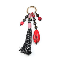 Breloques de sac en corde tressée avec perles multicolores en forme de fleurs, faites à la main JS, avec pendentifs cœur léopard turquoise et porte-clés
