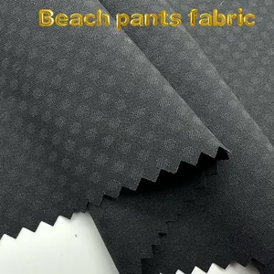 Nuevo producto 75D trenzado jacquard poliéster cuatro lados elásticos pantalones de playa poliéster amoníaco tela