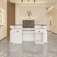 Mobilier commercial contemporain minimaliste rose blanc comptoir avant table de luxe salon de beauté réception pour magasin