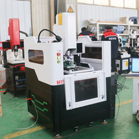 Haute qualité petit 4040 4 axes demi-couverture conception CNC routeur fraiseuse CNC routeur de bureau Mini CNC routeur CNC