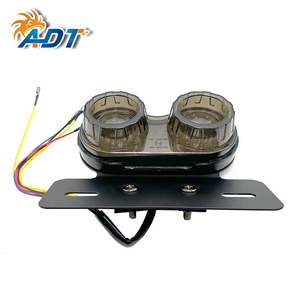 Feu arrière intégré pour moto avec support de plaque d'immatriculation - Product Image 1