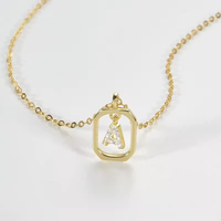 Vente en gros de colliers en argent sterling plaqué or S925 pour femmes exquis élégant Alphabet Zircon à la mode lien chaîne griffe réglage