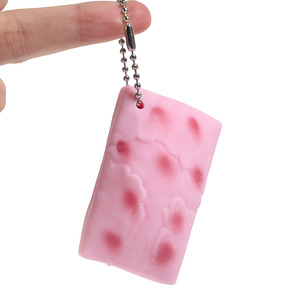 CHENXI Jouet anti-stress créatif en forme de gâteau de riz rose, à presser, porte-clés DIY pour enfants unisexe - Product Image 1