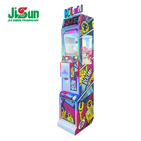 Machine à griffes Mega Mini Crane avec accepteur de pièces, distributeur de jouets, support espagnol et anglais, construction en plastique et métal, garantie 1 an