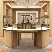Vitrine de présentation de vêtements personnalisée, design moderne pré-assemblé, 4 étagères en métal/verre/bois