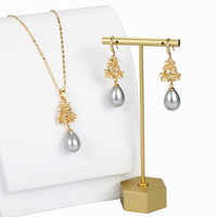 Nouvel ensemble de colliers pendentifs en perles en gros, bijoux en alliage plaqué or 14 carats de Chine, pour cadeaux de fiançailles et fêtes, style hawaïen