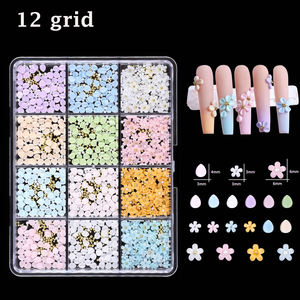 12 Compartimentos con Dijes 3D para Decoración de <span class=keywords><strong>Uñas</strong></span>, Flores Pequeñas Mixtas en <span class=keywords><strong>Rosa</strong></span> y Blanco, Cuentas Doradas y Plateadas, Resina Kawaii, Decoraciones Magnéticas Brillantes para <span class=keywords><strong>Uñas</strong></span>, Manualidades - Product Image 1