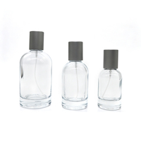 Soldes : Flacon de parfum en verre transparent à épaules rondes, base épaisse, rechargeable, atomiseur à brume fine avec capuchon gris mat, 30ml 50ml 100ml