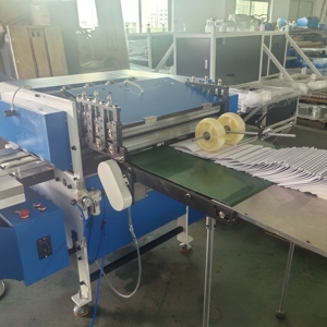 Máquina automática PLC para fabricar cuadernos escolares y de ejercicios con cubierta blanda de cartón, con motor y engranajes, para coser y doblar centralmente. - Product Image 4