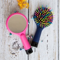 Brosse à cheveux démêlante à coussin d'air double face avec logo personnalisé, motif arc-en-ciel, forme S ondulée, avec miroir intégré pour le coiffage des filles