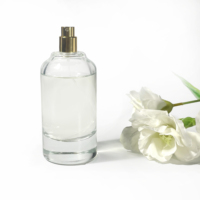 Bouteille de parfum en verre transparent de 100ml vide clair nouveau design atomiseur de pompe de pulvérisation pour l'emballage de soins de la peau bouteille de parfum de luxe