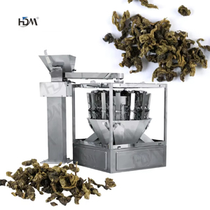 Máquina de pesaje de llenado de paquete pequeño de hierbas de té negro - Product Image 1