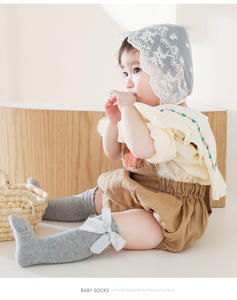 Vente en gros Chaussettes hautes colorées pour bébés filles au genou pour tout-petits Bas tube à volants avec nœud - Product Image 6