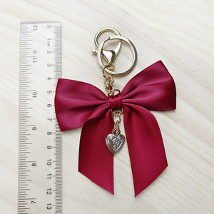 Luxe Cheer Ruban Arc Porte-clés De Mode Mignon Sac À Main Sac Charme Pendentif À La Main Bowknot Porte-clés Cheerleading Coeur Porte-clés - Product Image 5