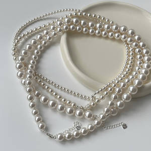 Collier en argent pur S925 avec perle de shijia, chaîne de clavicule luxueuse à l'éclat intense, design de niche - Product Image 1