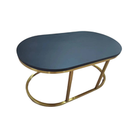 Table basse en pierre Table d'appoint ovale contemporaine gigogne avec base en métal doré