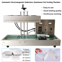 Machine automatique de scellement par induction de bouchon de bouteille en plastique