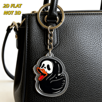 Porte-clés en acrylique Ghost Duck, canard en caoutchouc noir avec visage et bec orange, breloque transparente double face