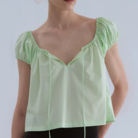 Blouse décontractée unie à col en V et manches bouffantes avec nœud sur le devant, design personnalisé pour femme, vente en gros