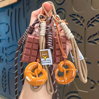 Porte-clés créatif vintage en acrylique en forme de bretzel, style Miu, avec breloque chocolat et cordon tressé, accessoire pendentif, vente en gros