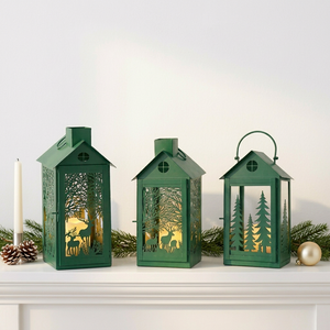 Decoración Navideña 2026, Faroles de Metal con Forma de Casa en Color Verde, con Recortes de Ciervos y Árboles - Product Image 1