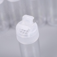 Petites bouteilles rondes en plastique à paillettes de 23 mm de large sur 65 mm de haut avec couvercle double ouvert blanc