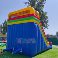 Grand toboggan gonflable à double voie multicolore pour enfants, idéal pour les anniversaires, les événements et les fêtes