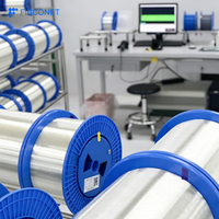 G657A2 Resin Desain Anti-kusut Atenuasi Rendah 0.26mm 5km-80km Gulungan Serat Telanjang Tegangan Tinggi untuk Jaringan FTTH/FTTB/FTTX