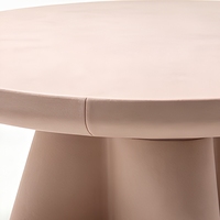 Table basse ronde Ellok, base en forme d'étoile rose clair, table basse à moyenne hauteur, avec finition en daim mat pour salon