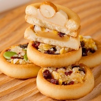 Biscuits sucrés multi-saveurs en vrac, biscuits croustillants à la couche extérieure d'amandes et de fruits secs pour le petit-déjeuner et le thé de l'après-midi